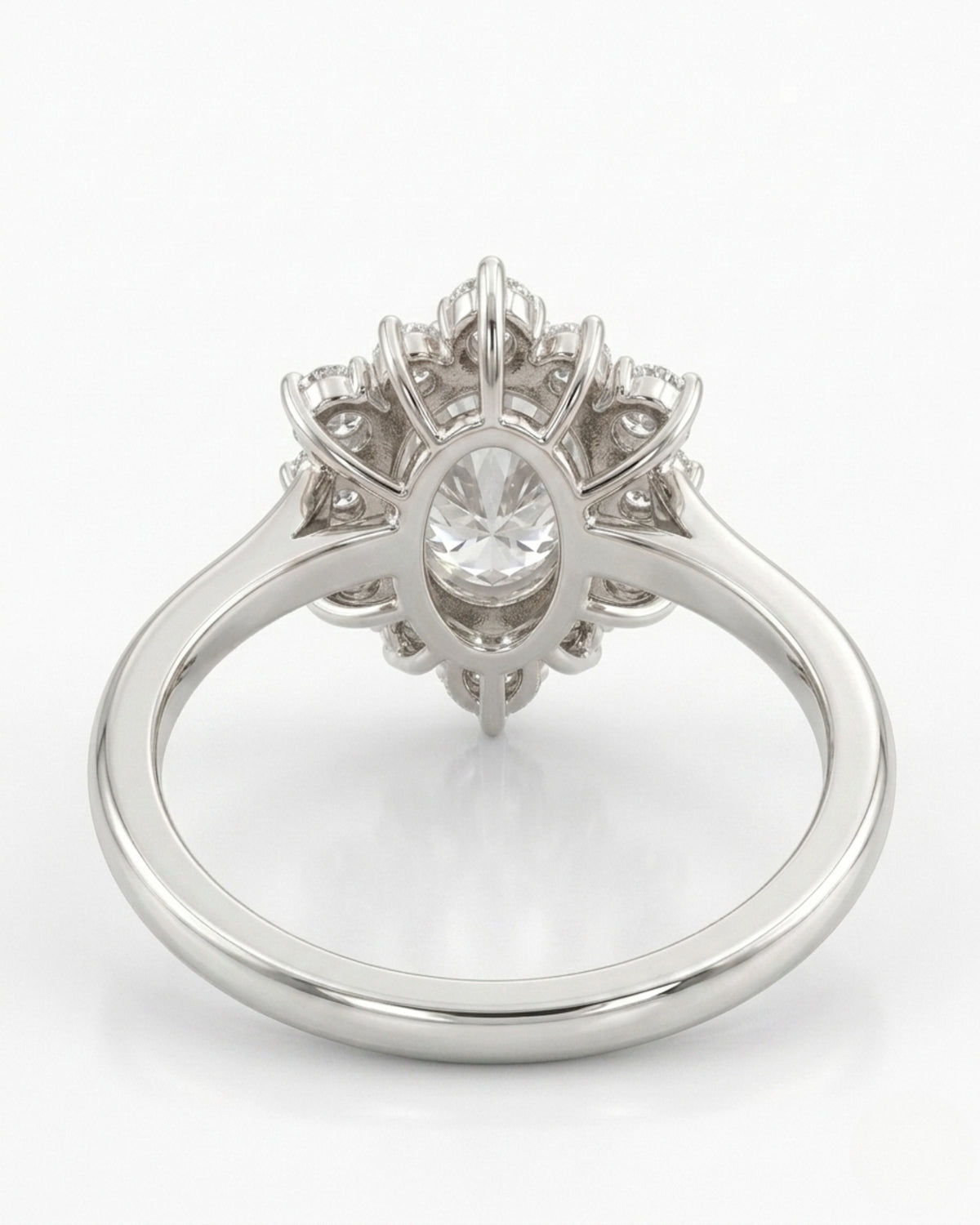 Oval halo moissanite engagement ring for a soft romantic proposal in 18K white gold | SARATTI