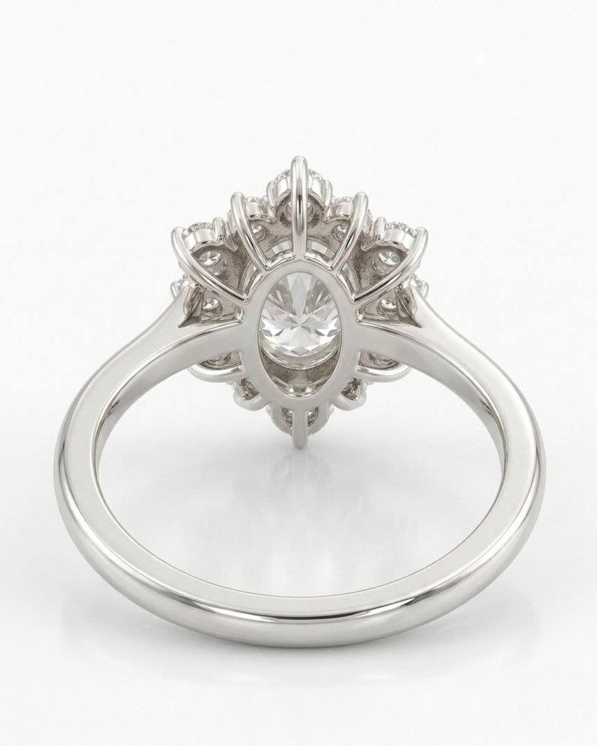 Oval halo moissanite engagement ring for a soft romantic proposal in 18K white gold | SARATTI