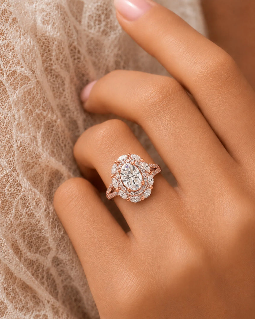 Oval halo moissanite engagement ring for a soft romantic proposal in rose gold | SARATTI