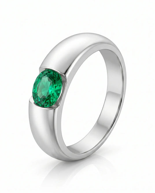 Oval natural emerald solitaire ring in 18K white gold | SARATTI