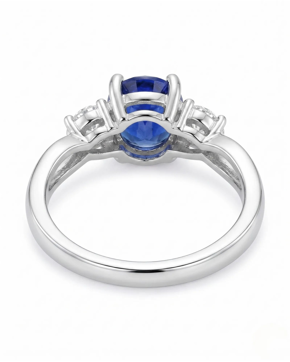 Oval natural sapphire ring with round side diamonds in polished platinum - SARATTI