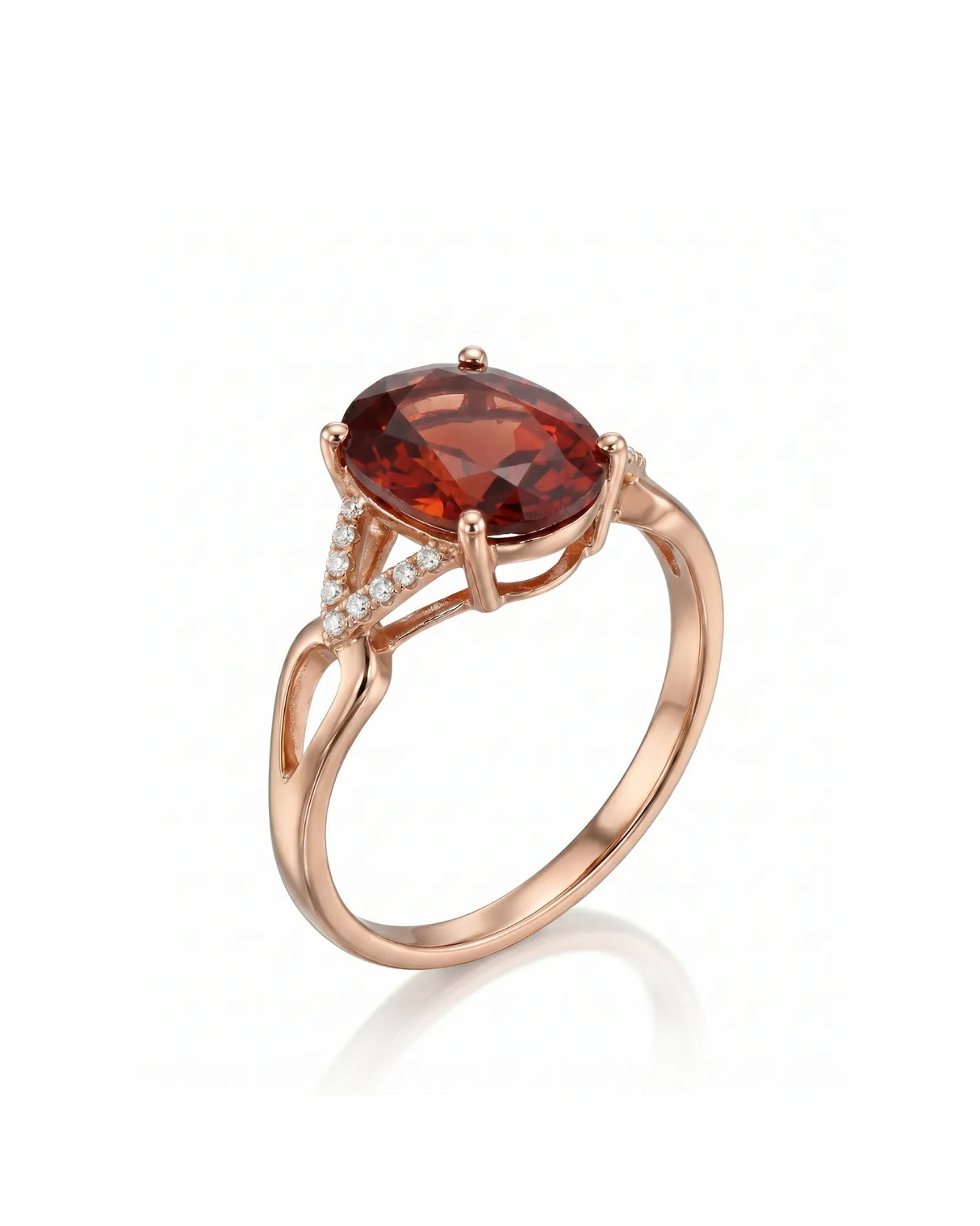 Oval orange garnet ring with diamond frame in 18K rose gold | SARATTI