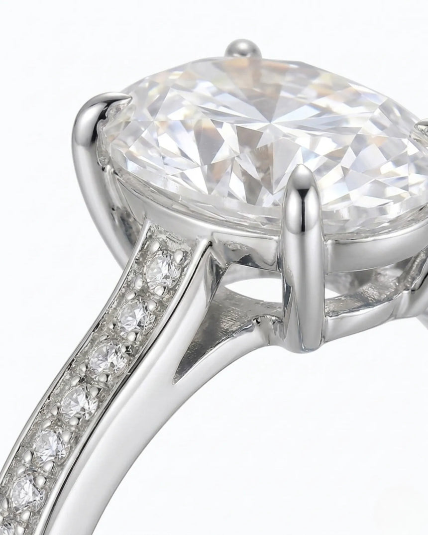Oval pavé moissanite engagement ring for a refined proposal in 18K white gold | SARATTI