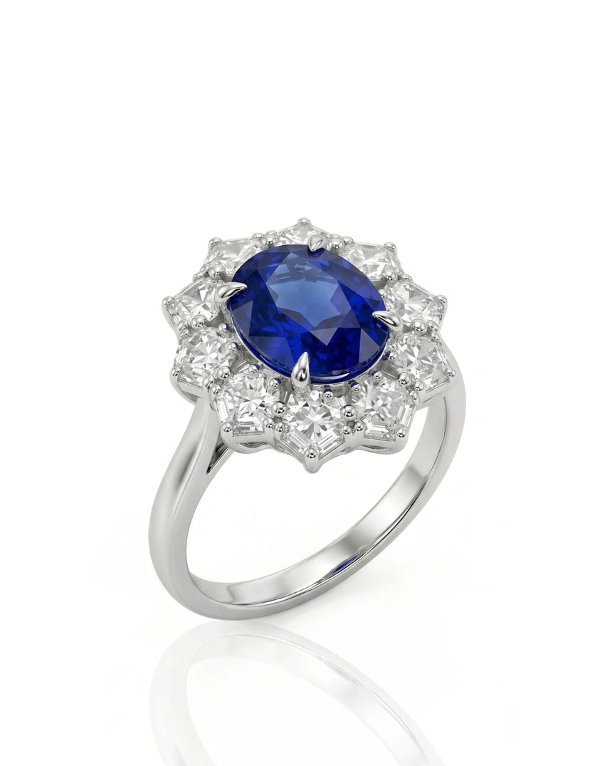 Oval royal blue sapphire ring with floral diamond halo in 18K white gold | SARATTI