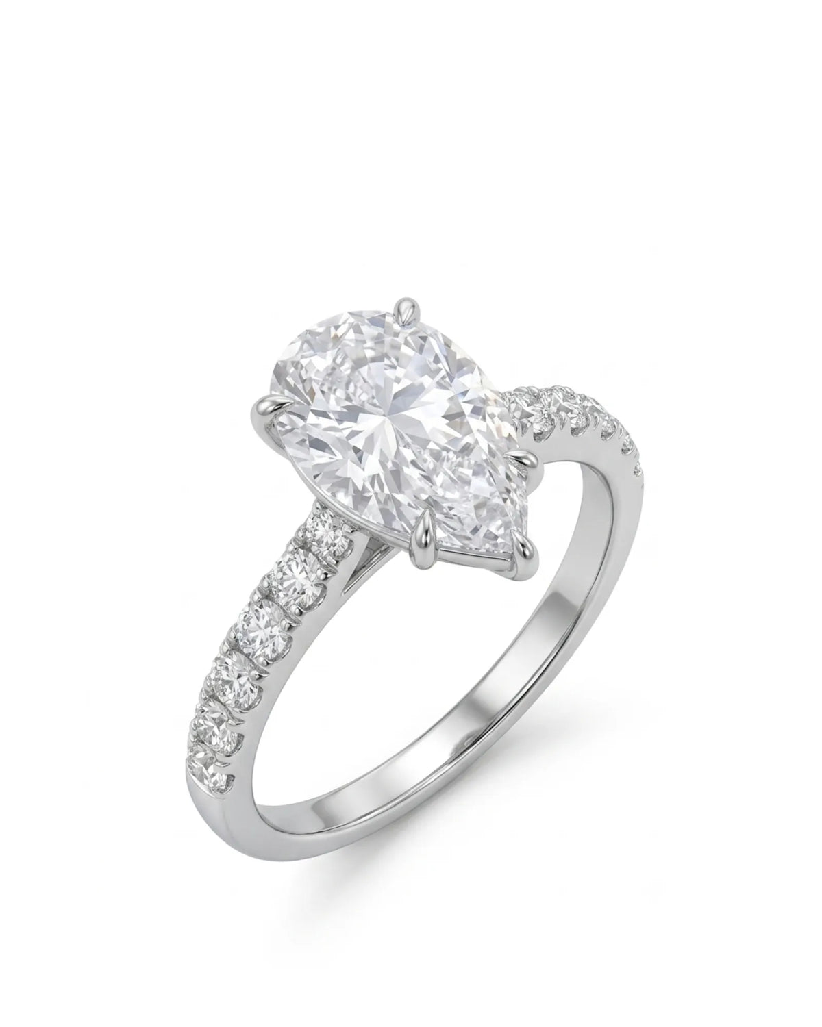Pear cut moissanite engagement ring with scallop-set round side stones in 18K white gold | SARATTI