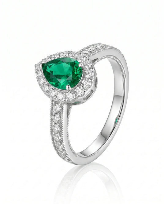 Pear emerald cocktail ring with diamonds in 18K white gold | SARATTI