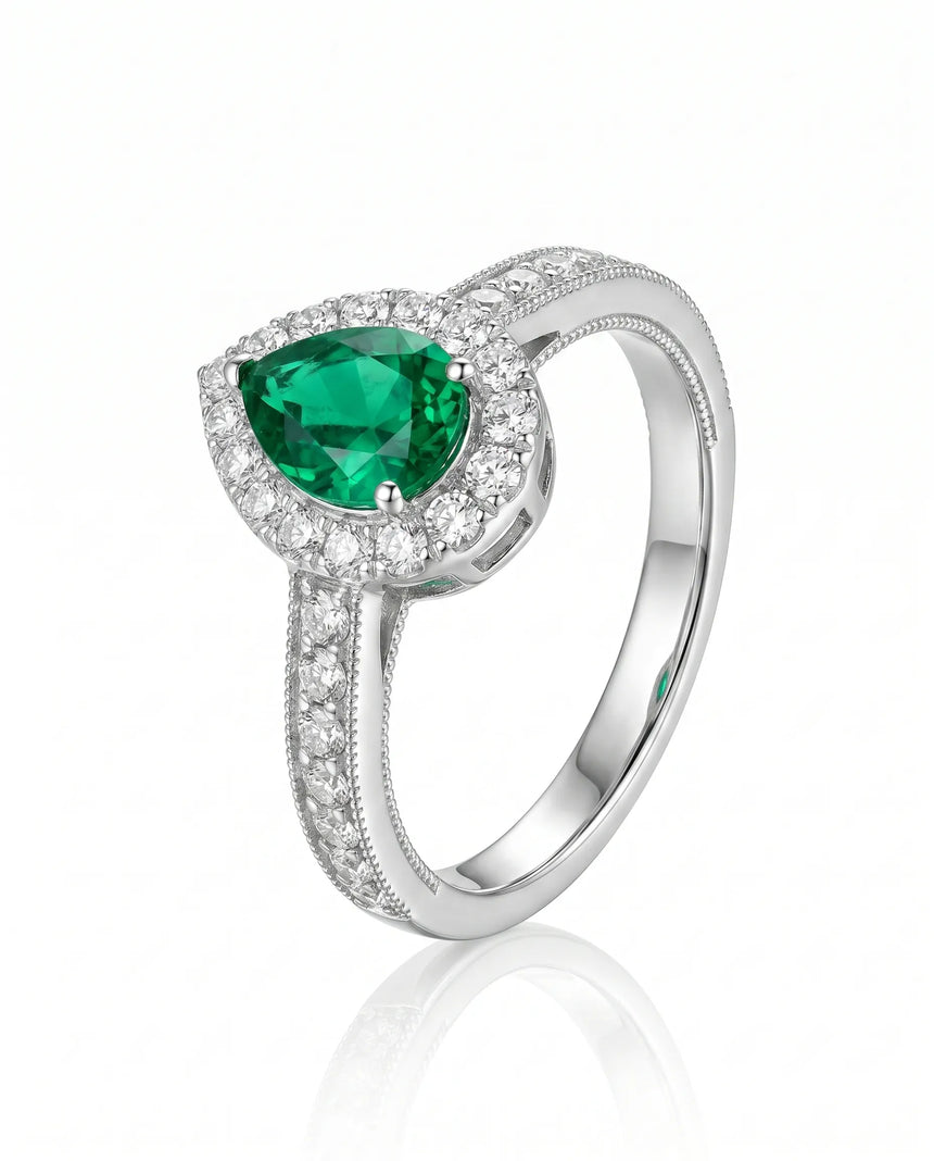 Pear emerald cocktail ring with diamonds in platinum | SARATTI
