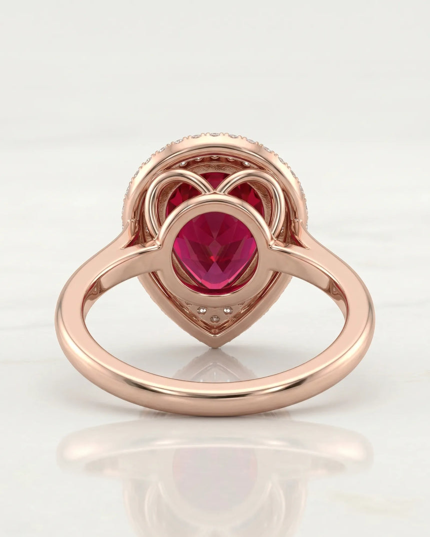 Pear red-pink tourmaline ring with double diamond halo in 18K rose gold | SARATTI