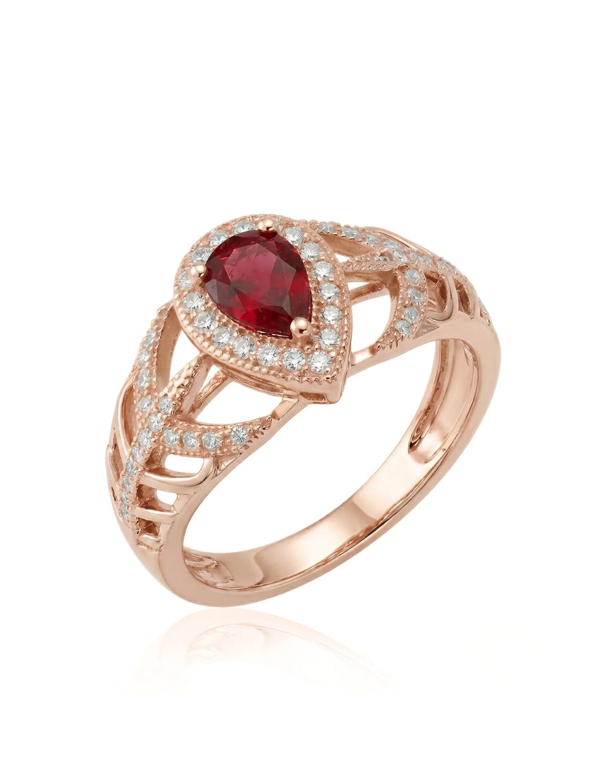 Pear ruby ring with diamond halo and split shank in 18K rose gold | SARATTI