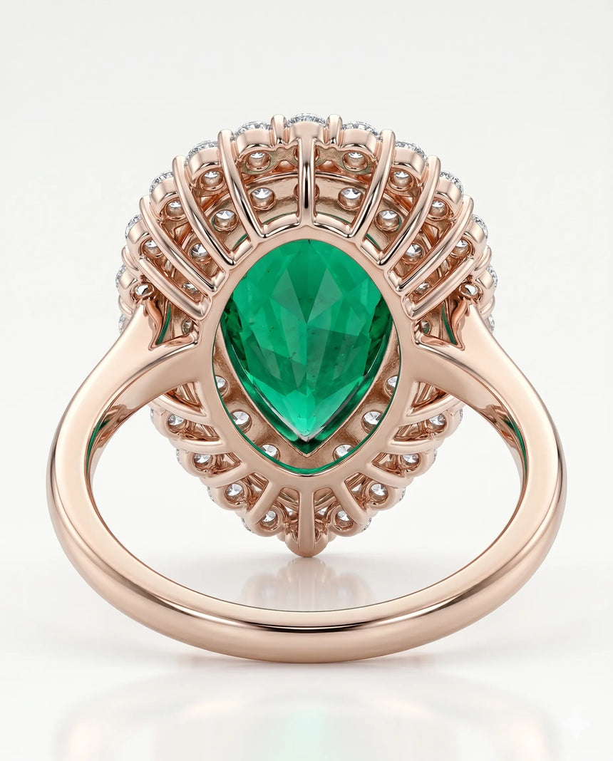 Pear shaped emerald halo ring in 18K rose gold | SARATTI