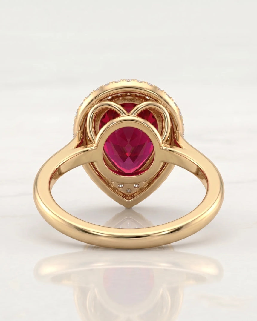 Pear tourmaline engagement ring with double diamond halo in 18K yellow gold | SARATTI