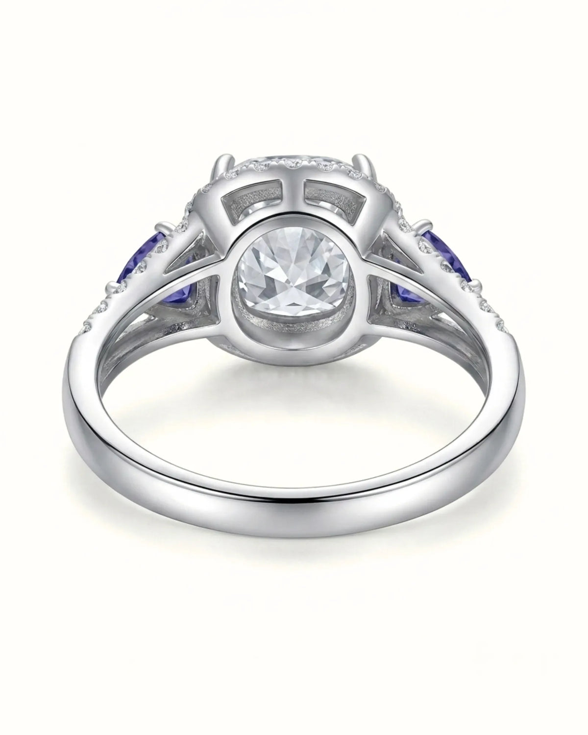 Platinum moissanite ring with cushion center, halo, and tanzanite accents | SARATTI