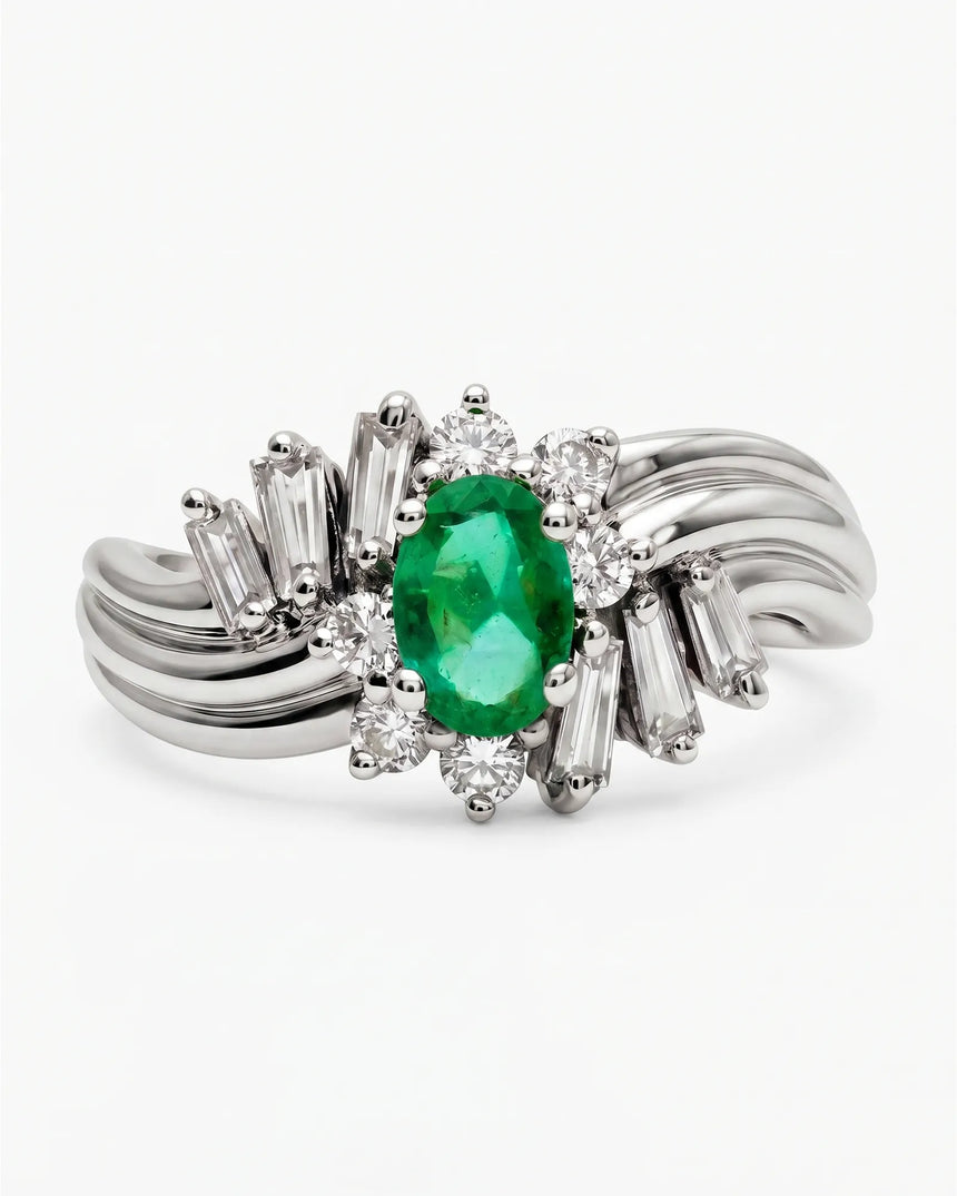 Platinum natural emerald ring with asymmetrical diamond halo design | SARATTI