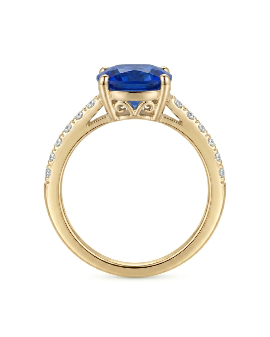 Prong set blue sapphire ring with minimalist diamond band in 18K yellow gold | SARATTI