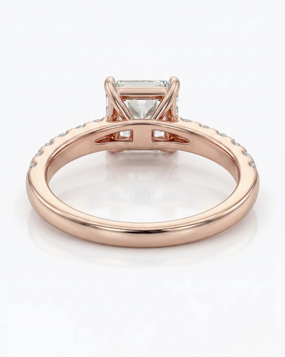 Radiant-cut diamond engagement ring with sparkling pavé shoulders in 18K rose gold for a modern proposal | SARATTI