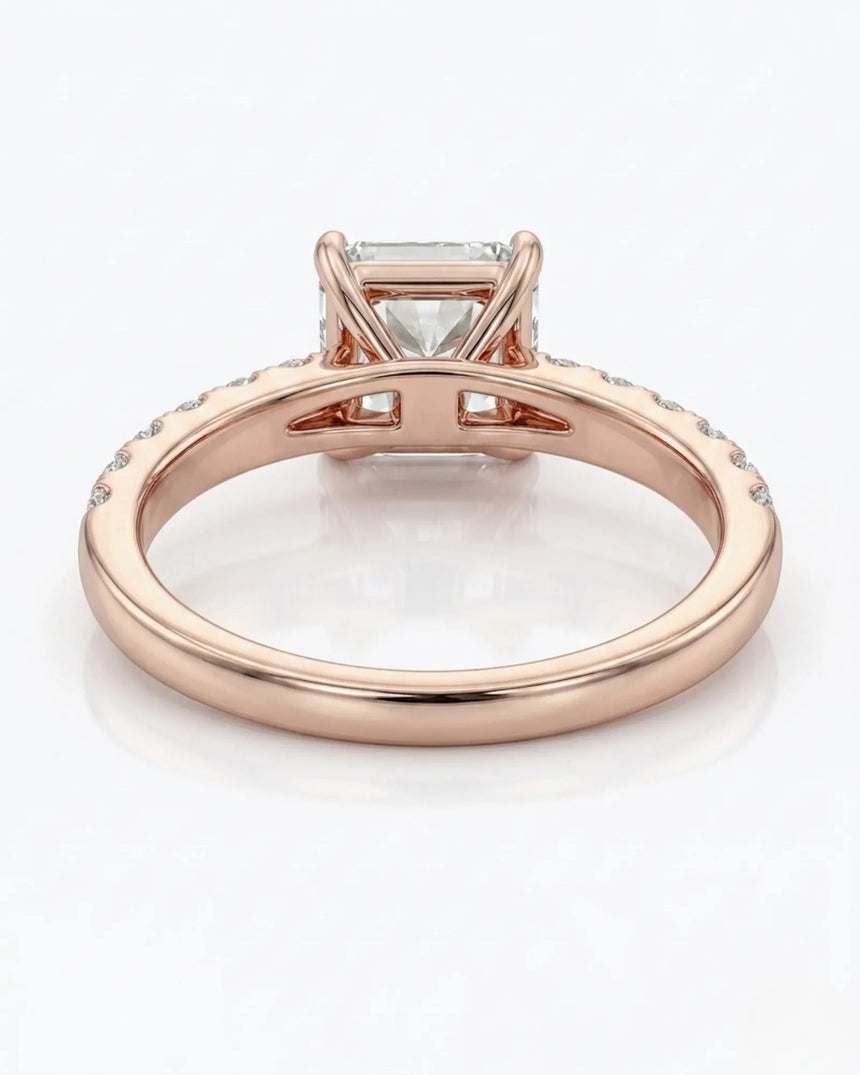 Radiant-cut diamond engagement ring with sparkling pavé shoulders in 18K rose gold for a modern proposal | SARATTI