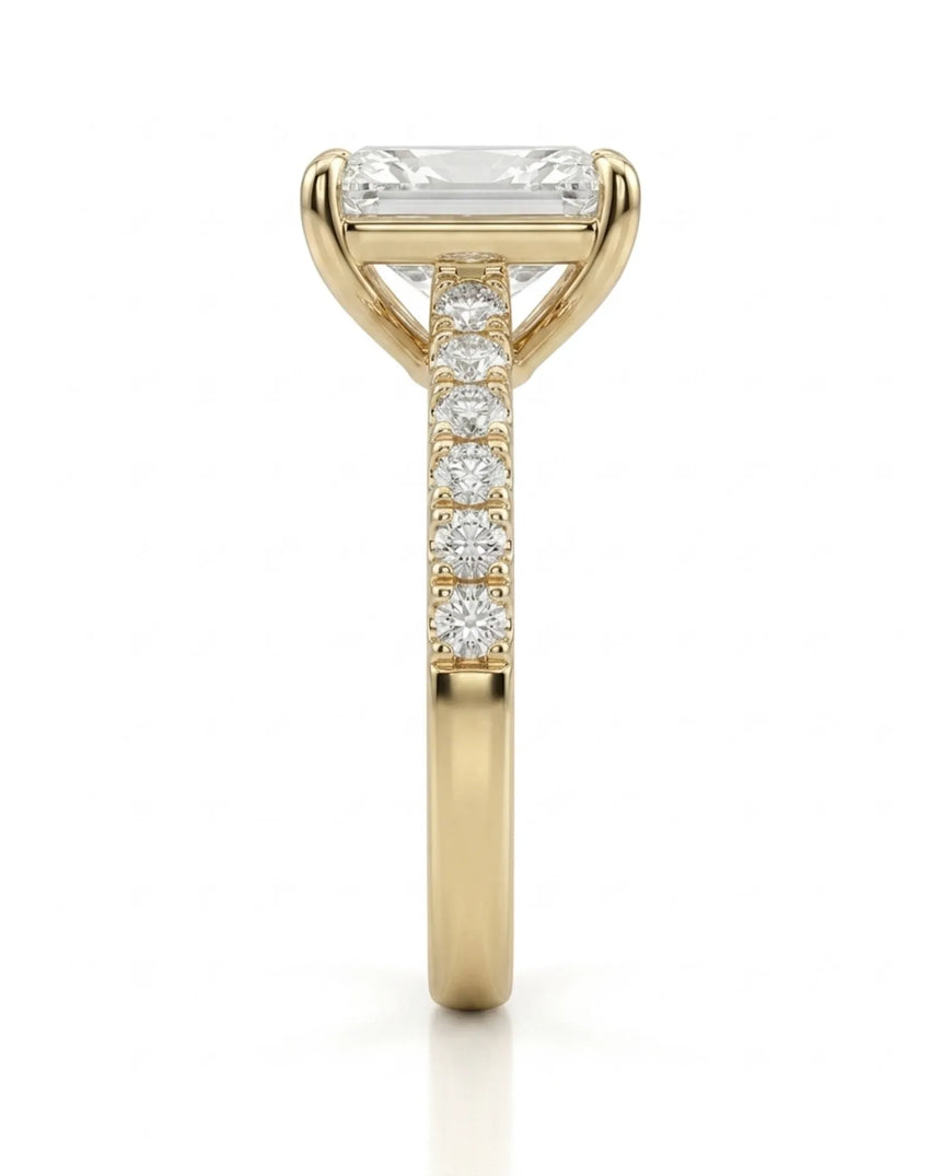 Radiant-cut diamond engagement ring with sparkling pavé shoulders in 18K yellow gold for a timeless proposal | SARATTI