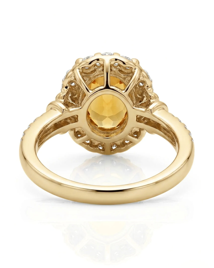 Radiant yellow sapphire ring with round diamond halo in warm yellow gold | SARATTI