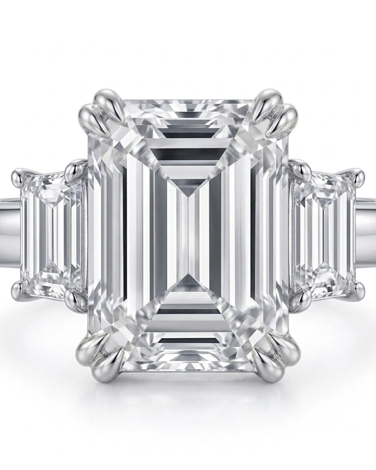 Rectangle moissanite ring with emerald side stones and polished platinum band | SARATTI