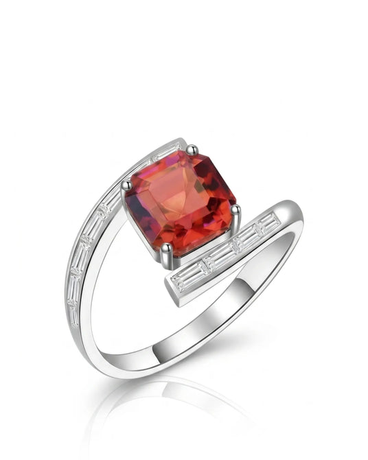 Reddish pink tourmaline ring with geometric center stone and baguette diamonds in 18K white gold | SARATTI