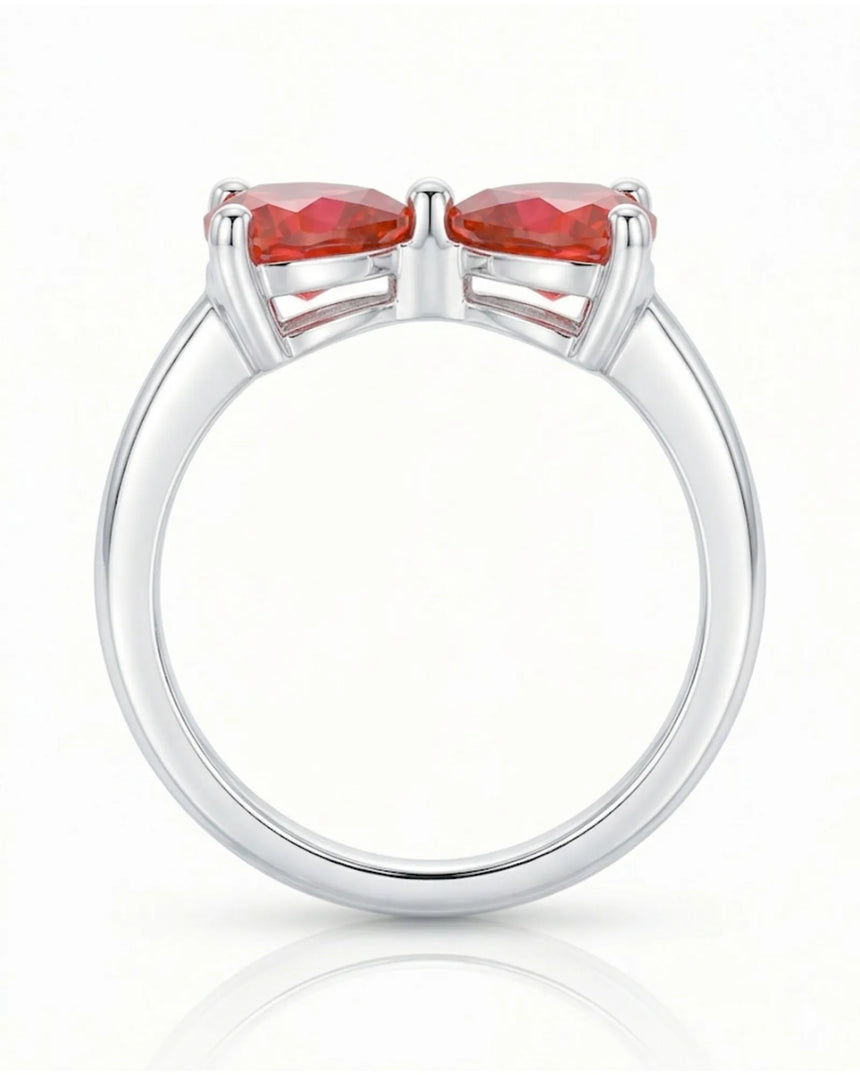 Romantic bow style ruby ring with twin heart gemstones in Platinum | SARATTI