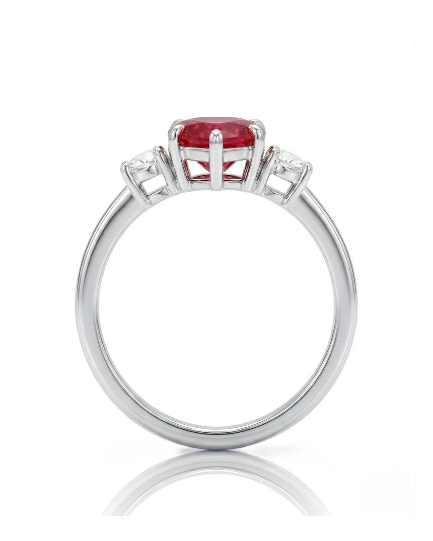 Romantic heart-shaped ruby ring with two diamond side stones in Platinum | SARATTI