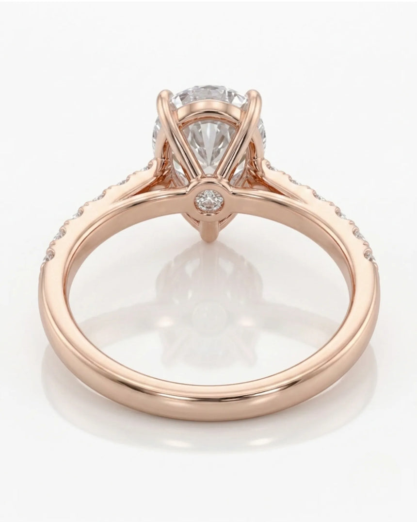 Romantic pear moissanite engagement ring with brilliant side stones for proposals in 18K rose gold | SARATTI