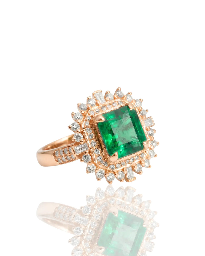 Rose gold emerald and diamond ring with bold halo design | SARATTI