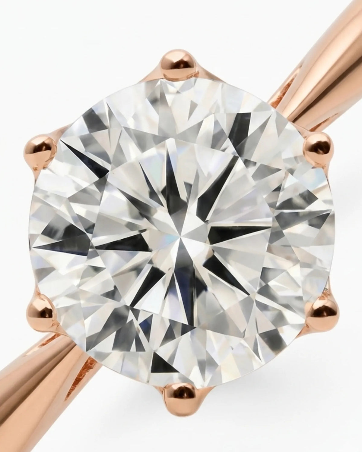 Rose gold moissanite engagement ring for a classic romantic proposal | SARATTI
