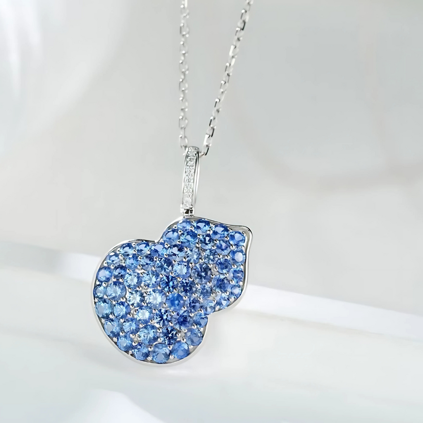 Azure Temptation: Blue Sapphire Apple Pendant Necklace
