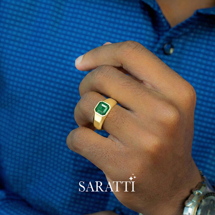 Mens emerald wedding ring worn on hand in 18K yellow gold | SARATTI