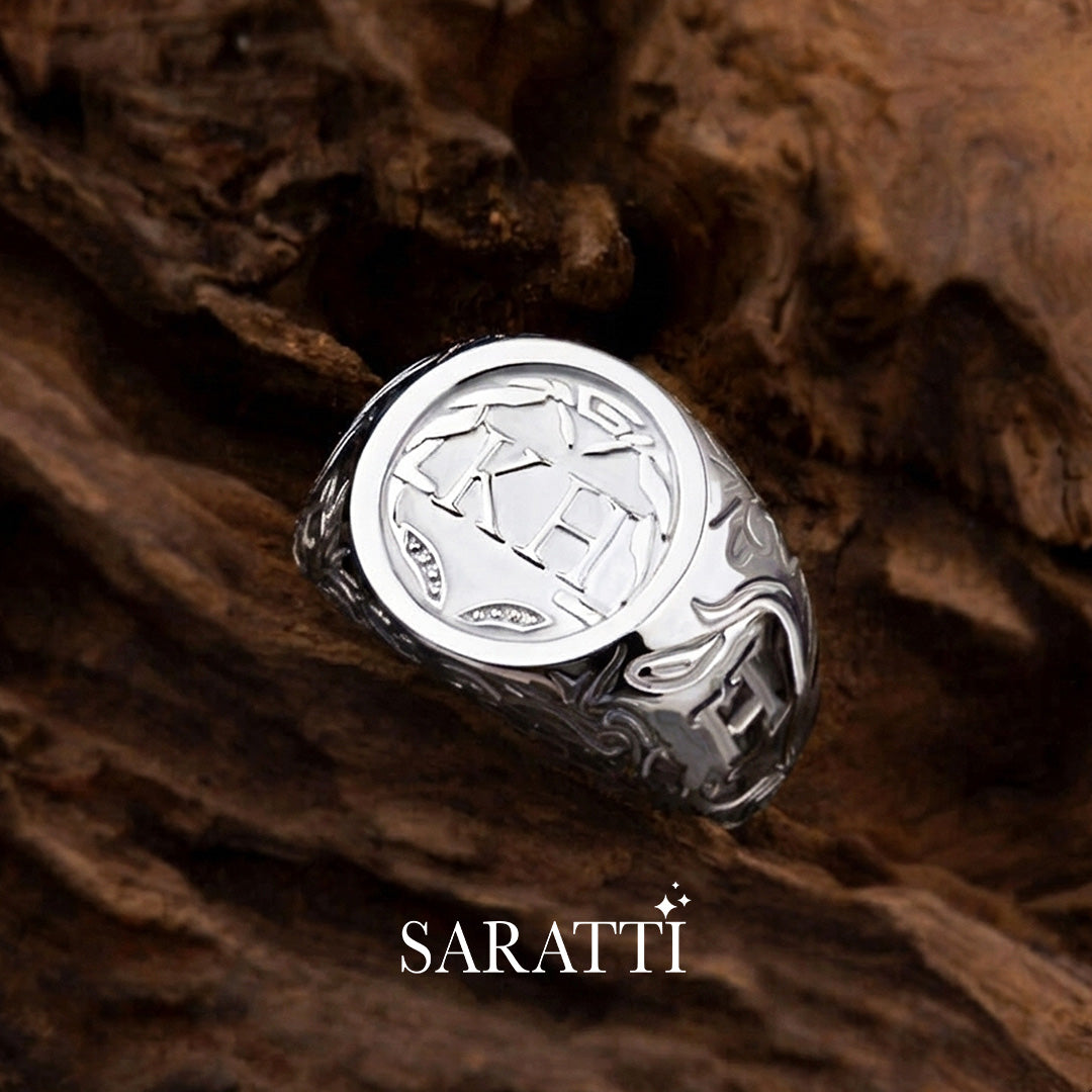 Engraved initial design detail of mens initial ring in platinum | SARATTI