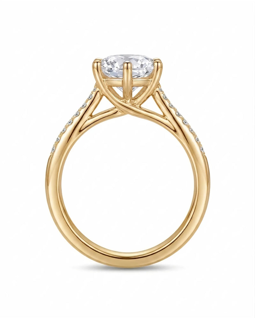 Round diamond engagement ring with six-prong center setting and pavé accents in 18K yellow gold | SARATTI
