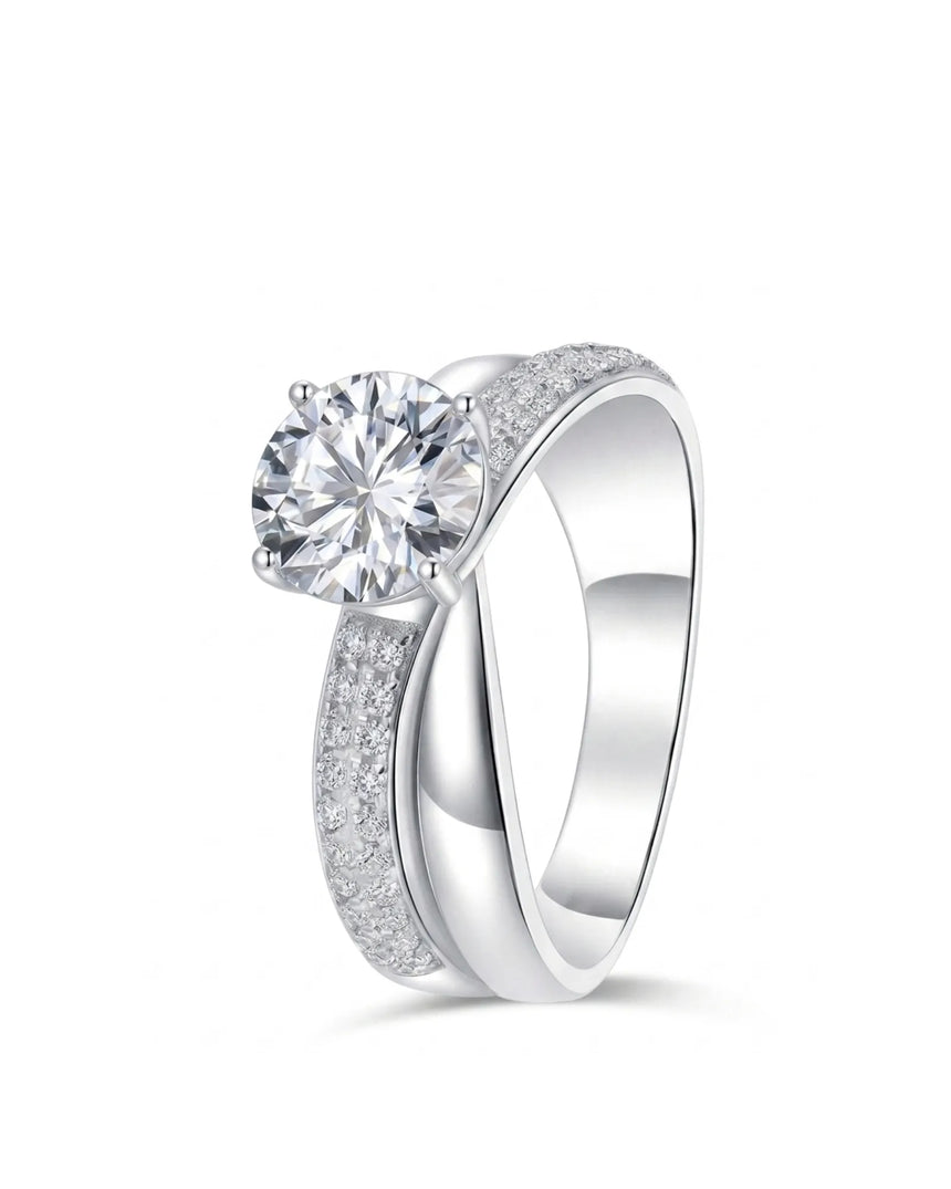 Round moissanite engagement ring with twisted split shank and pavé accents in polished platinum | SARATTI