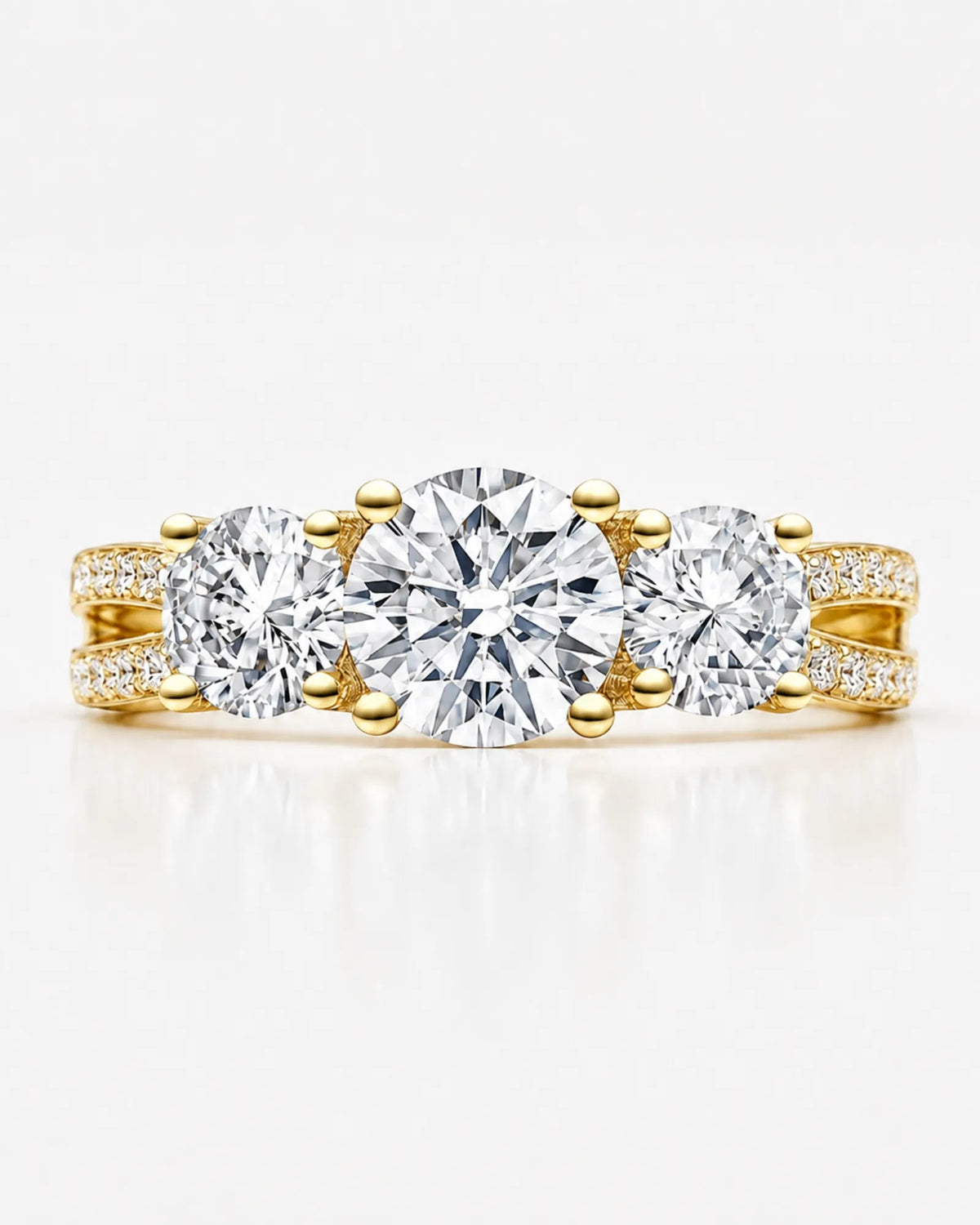 Round moissanite engagement ring with warm yellow gold setting and discreet gallery accent | SARATTI