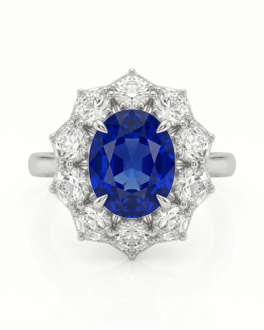Royal blue oval sapphire ring with brilliant diamond floral frame in white gold | SARATTI