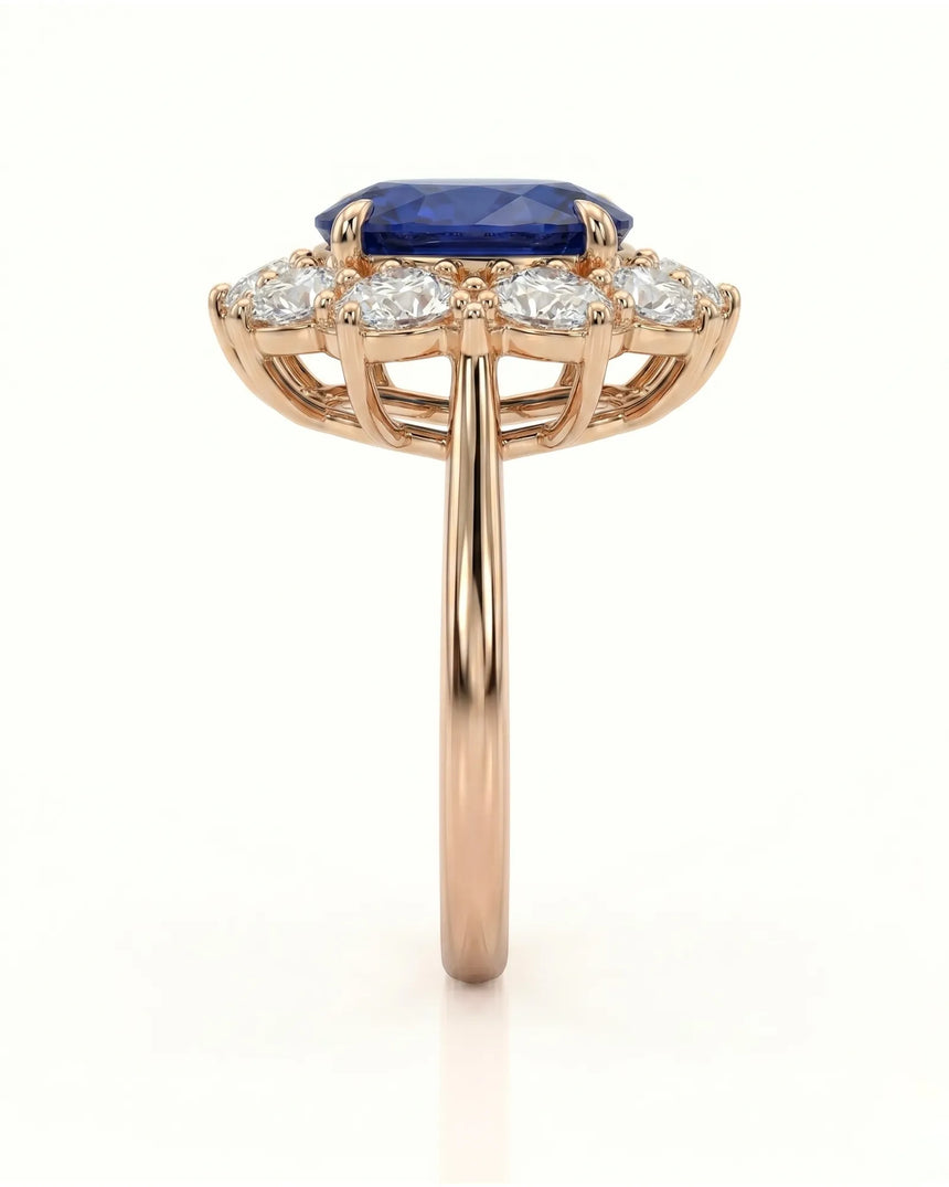 Royal blue oval sapphire ring with brilliant diamond halo in 18K rose gold | SARATTI