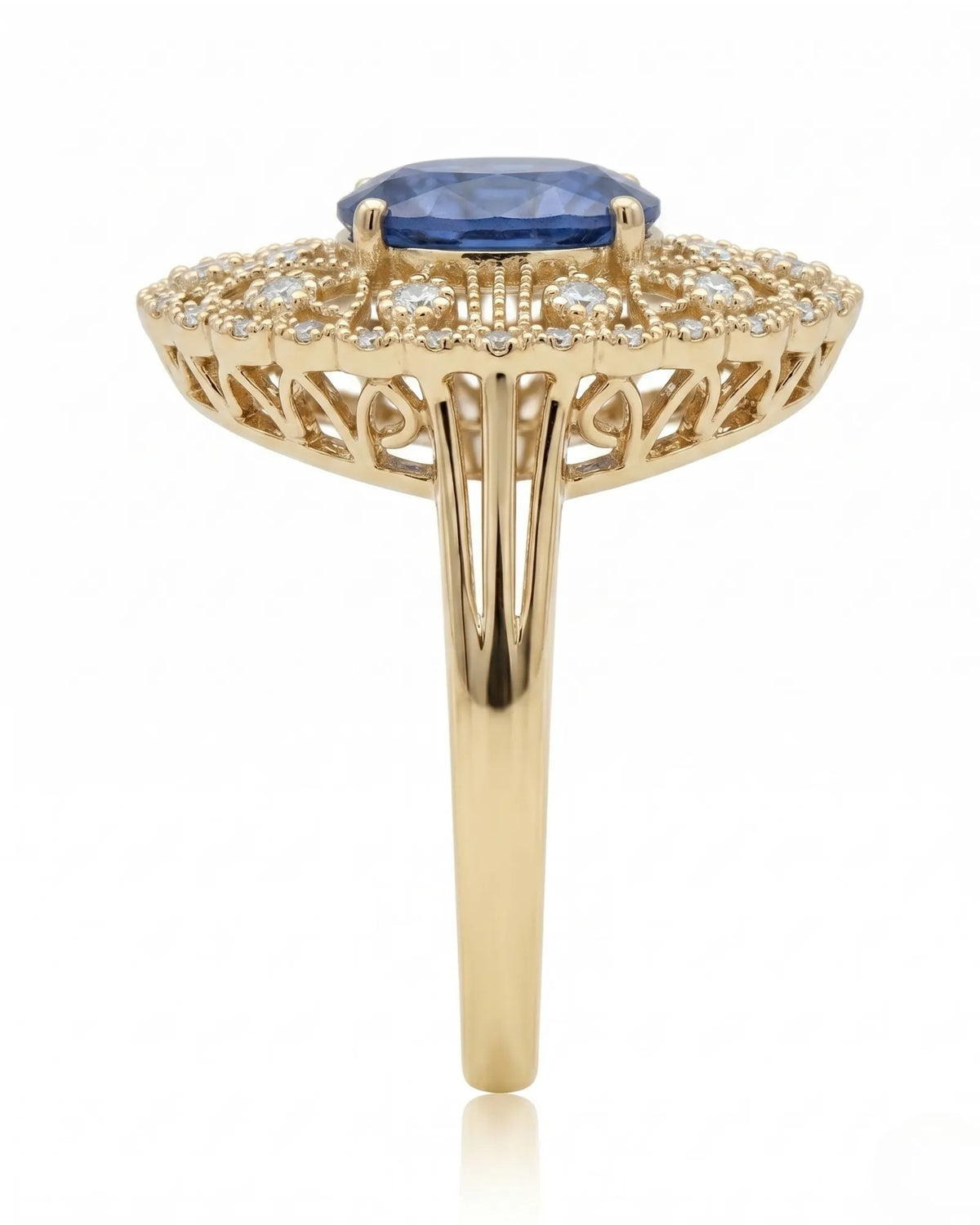 Royal blue oval sapphire ring with round brilliant diamonds in yellow gold | SARATTI