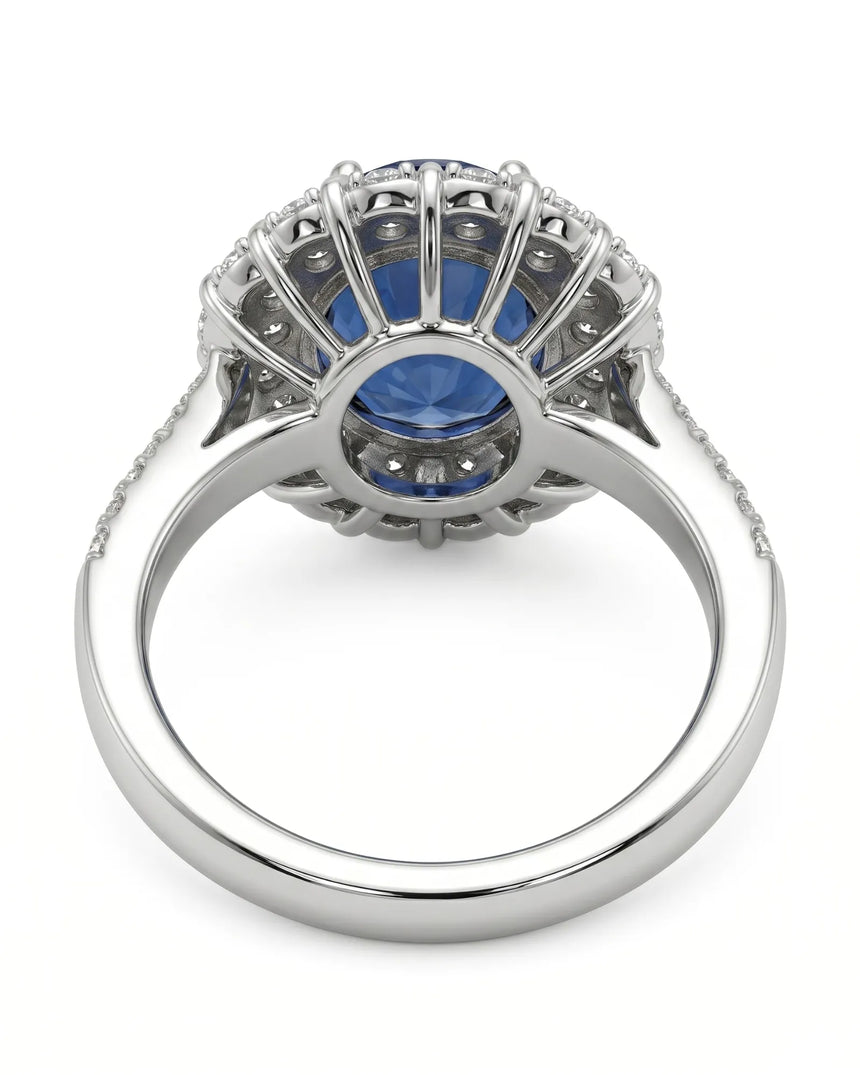 Royal blue round sapphire ring with mixed diamond cuts in enduring platinum | SARATTI