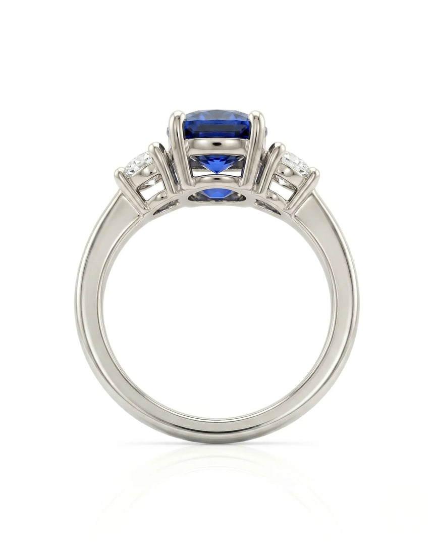 Sapphire and diamond engagement ring with classic three-stone design in platinum | SARATTI