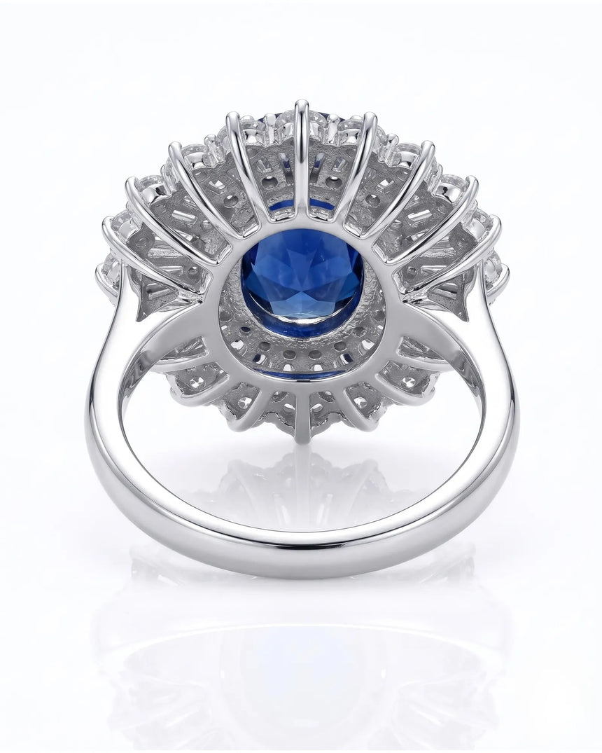 Sapphire and diamond engagement ring with dramatic halo in 18K white gold | SARATTI