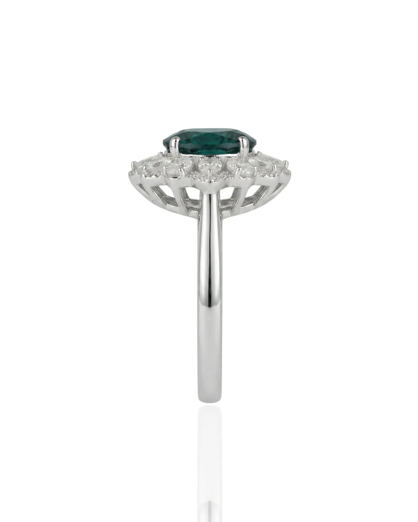 Sapphire and diamond engagement ring with floral halo design in 18K white gold | SARATTI