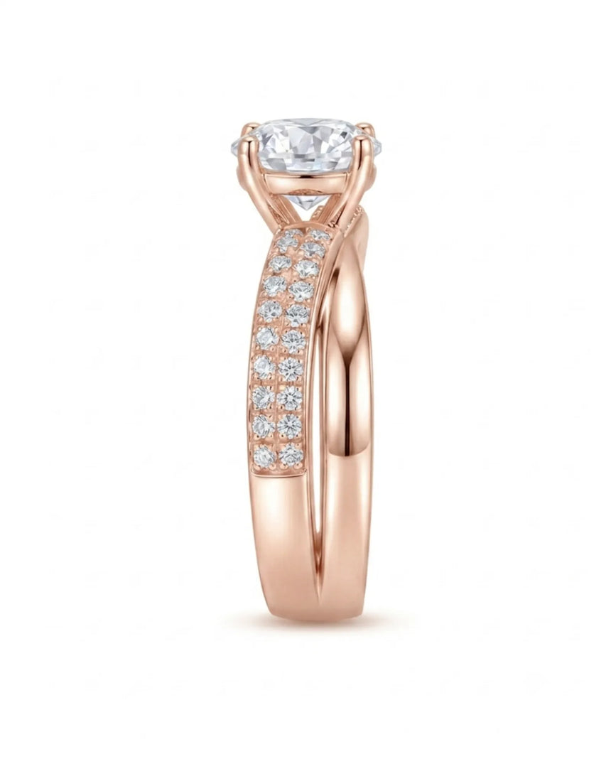 Sculptural split shank moissanite ring with polished ribbon and pavé detailing in 18K rose gold | SARATTI