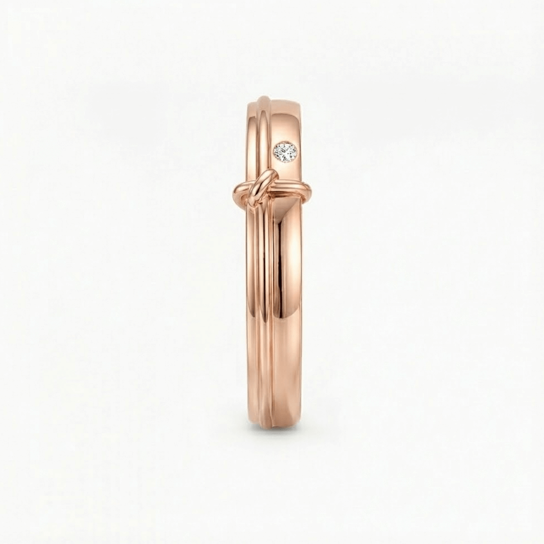 Rose gold ring with a diamond on a white background | Side View of 18K Rose Gold Men’s Band with 0.03ct Bezel-Set Diamond – SARATTI