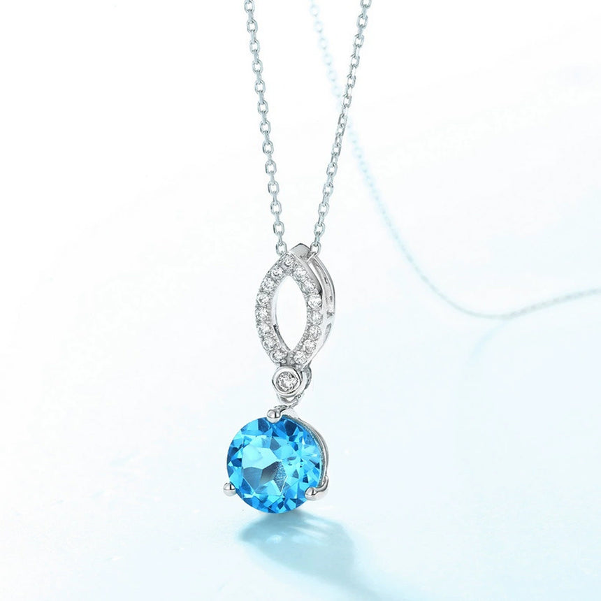 Prism Drift: Swiss Blue Topaz Simulated Diamond Pendant