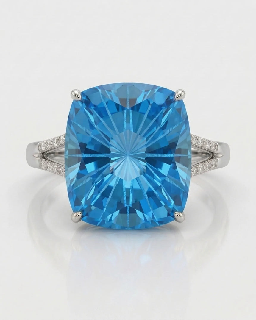 Starburst-cut topaz statement ring with open gallery and pavé shoulders in 18K white gold | SARATTI