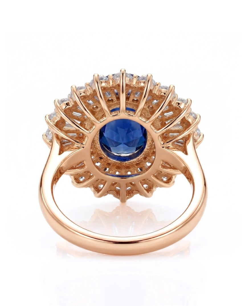 Sunburst sapphire ring with tapered baguette and round diamonds in 18K rose gold | SARATTI