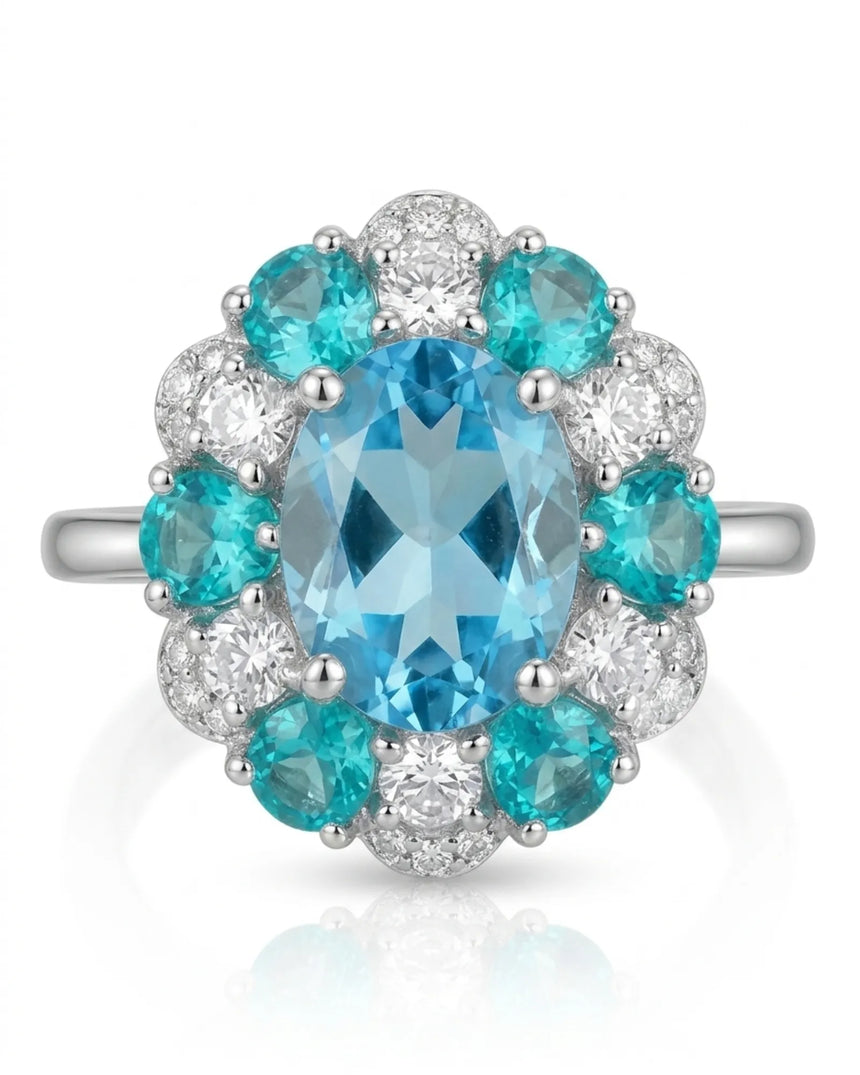 Swiss Blue topaz engagement ring with romantic floral halo in polished platinum | SARATTI