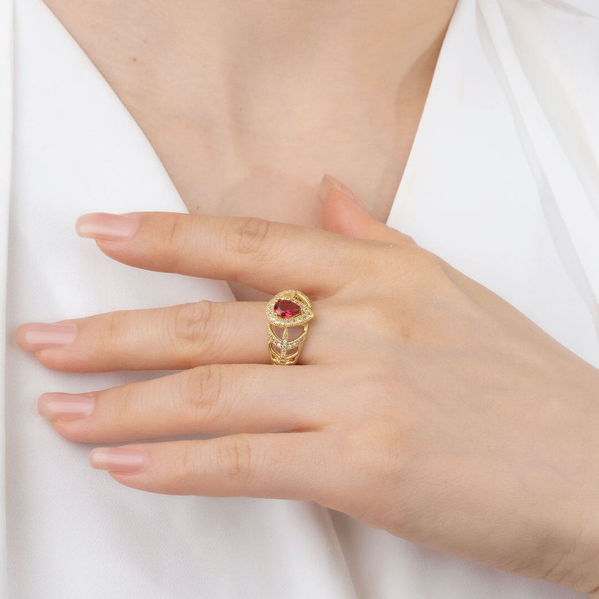 Tear Drop Natural Ruby and Diamonds 18K Yellow Gold Ring on Finger | Saratti