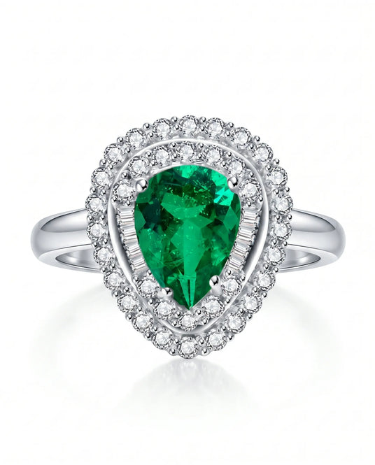 Teardrop emerald ring with diamonds in 18K white gold | SARATTI